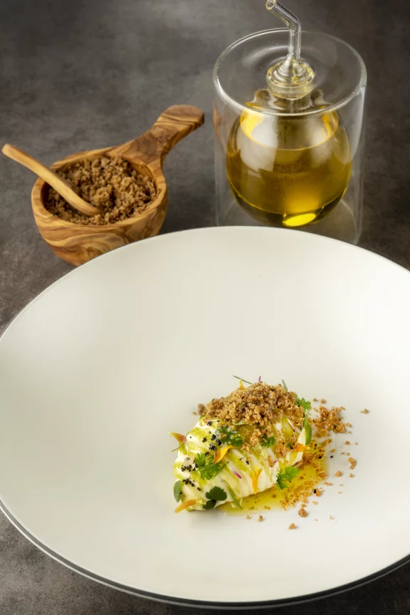 Matriochka avec sa purée d'huile d'olive enrobée de chocolat blanc et d'une crème aux cinq citrons.