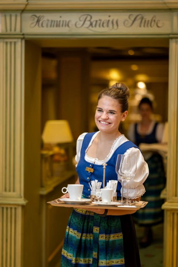 Le service avec le sourire.