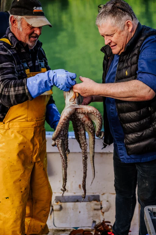 Loïc Le Bail avec l'un de ses amis pêcheurs.